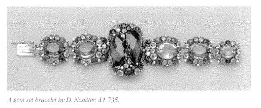 A gem set bracelet by D.Nossiter.